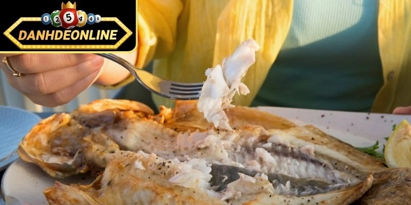 Chiêm bao ăn cá cùng người khác